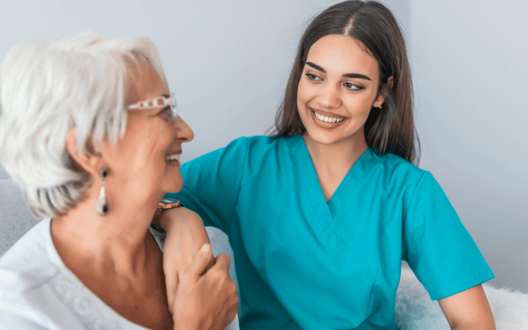 nurse helping older woman